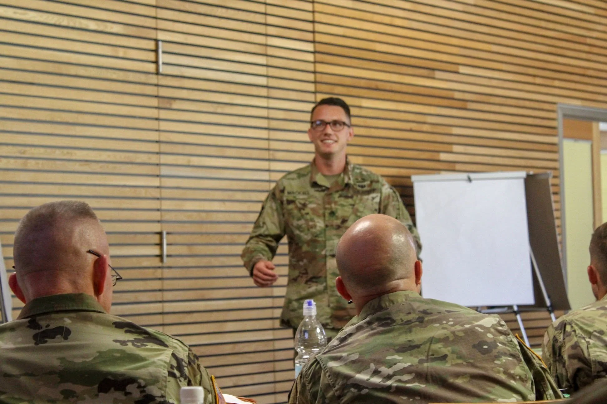 Cody Mackall briefing soldiers as the Department of the Army BOSS Representative